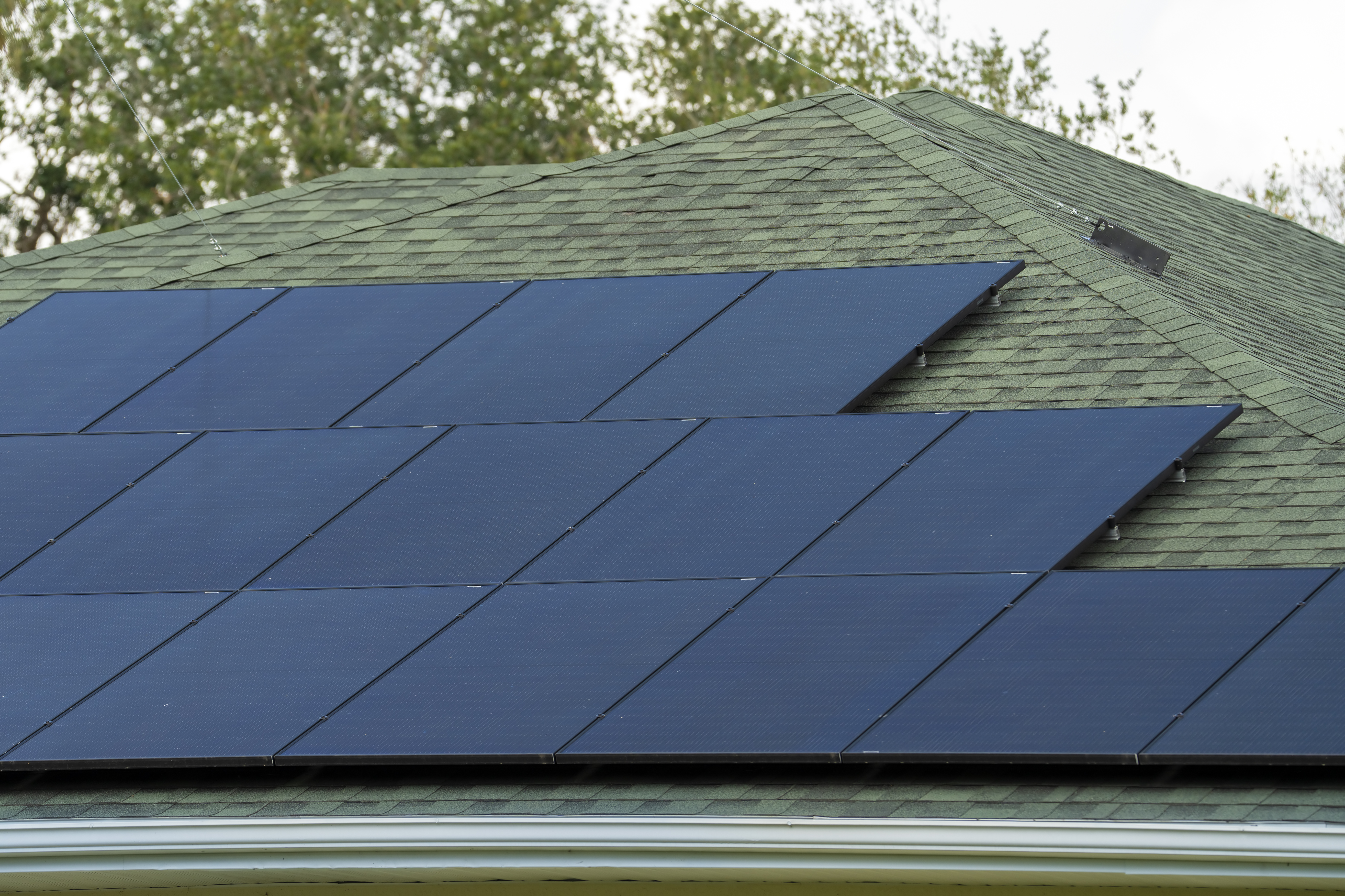 Residential solar panel array on a pitched roof